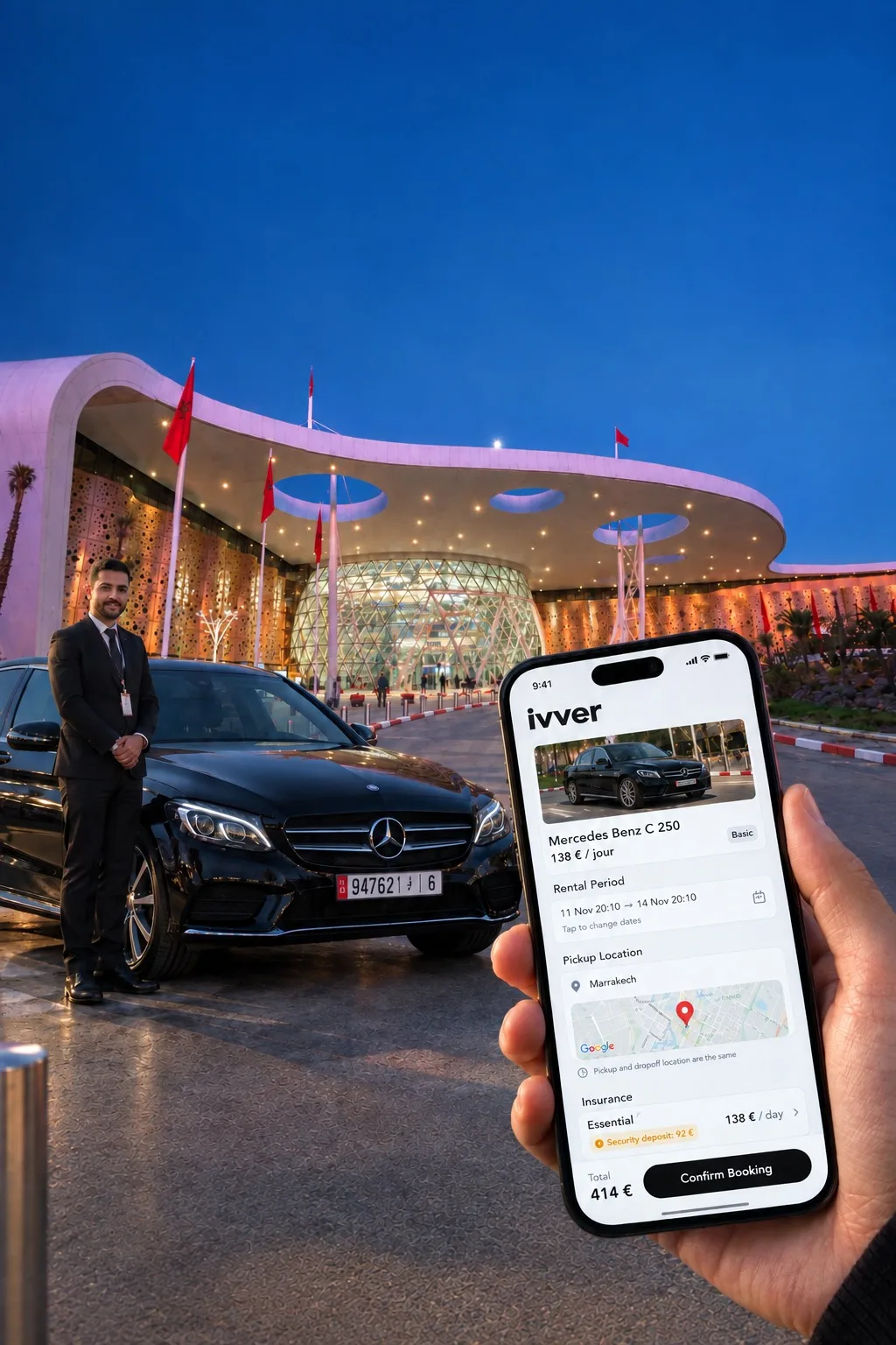A verified IVVER provider handing over a black Mercedes at Marrakech Menara airport, with the IVVER booking screen on a phone in the foreground